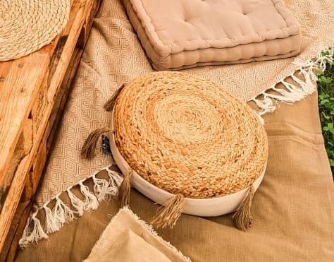 Coussin rond jute avec pompons